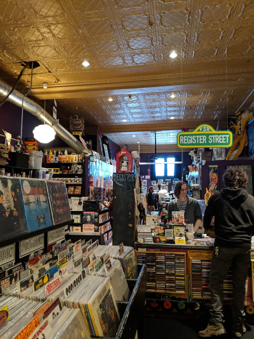Vinyl racks, posters and the pressed-tin ceiling inside Found Sound in Ferndale.