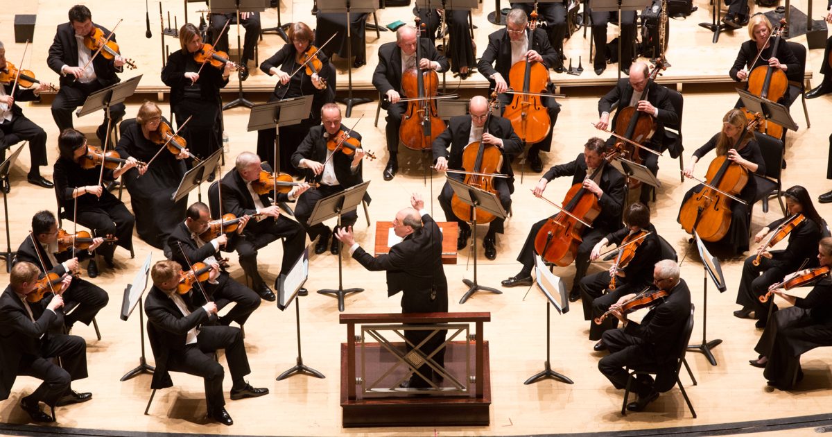 Atlanta Symphony Orchestra performing with its conductor
