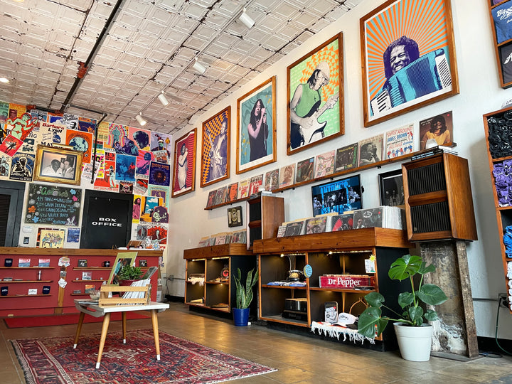 Vinyl bins and concert posters inside Big Henry’s Vinyl & Gifts beside Antone’s in Austin.