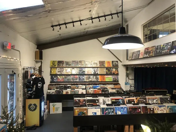 Used records and wall displays inside BLK Vinyl in East Austin.
