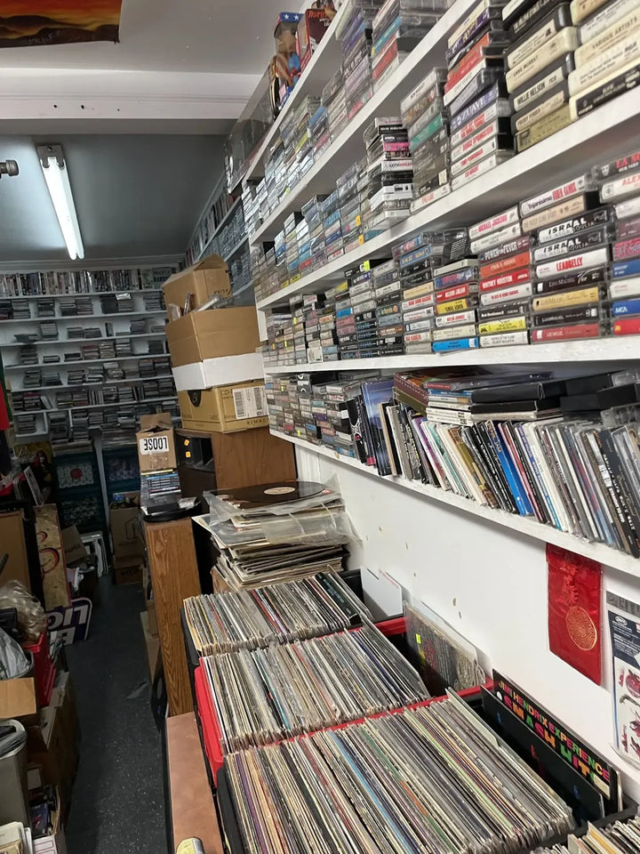 Vinyl bins and shelves of tapes and CDs inside Turntable Records on South First Street in Austin.