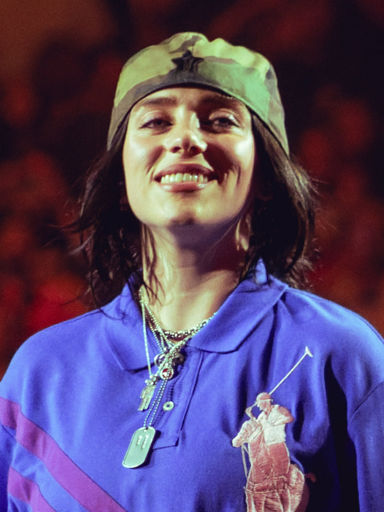 Billie Eilish performing at the O2