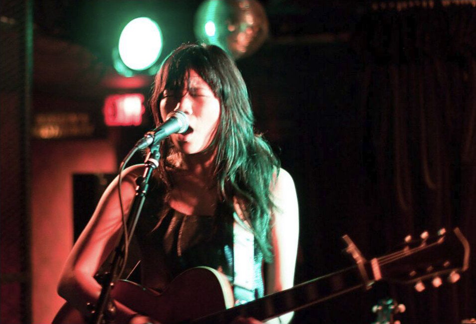 Thao performing onstage at the Biltmore Cabaret in Vancouver