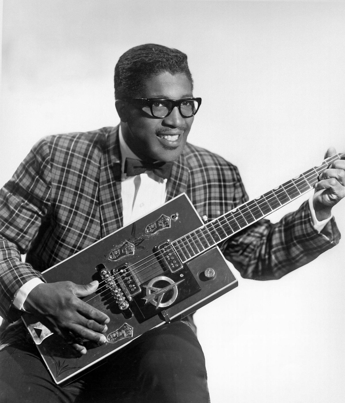 Bo Diddley with his rectangular Gretsch guitar in a 1957 publicity portrait