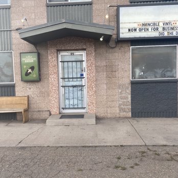 Invincible Vinyl storefront at 99 Kalamath St in Denver.
