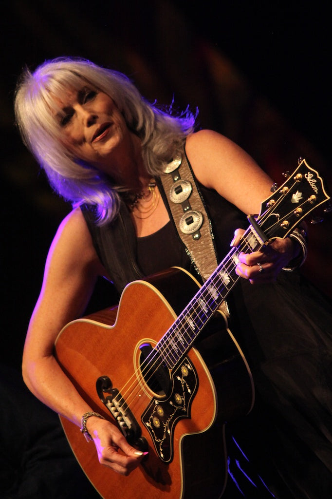 Emmylou Harris singing and playing guitar at Greenbelt Picnic