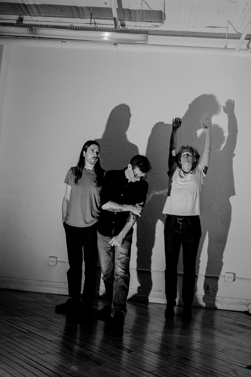 FACS posing together in a black-and-white photograph