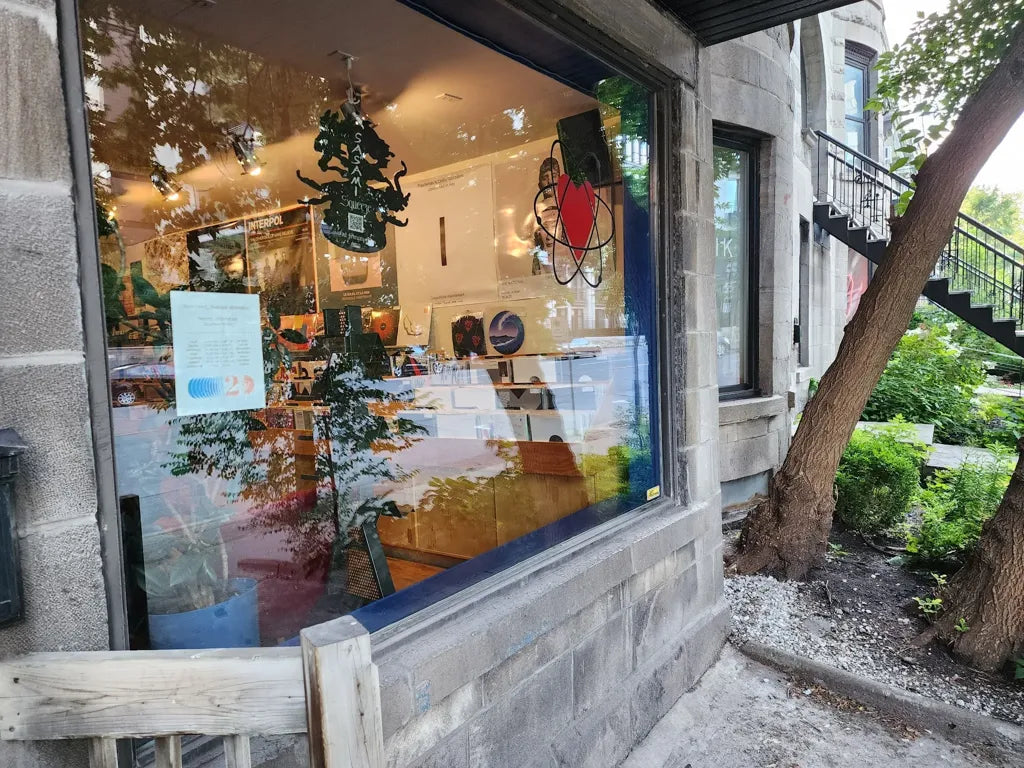 Atom Heart storefront and window display on Sherbrooke Est.