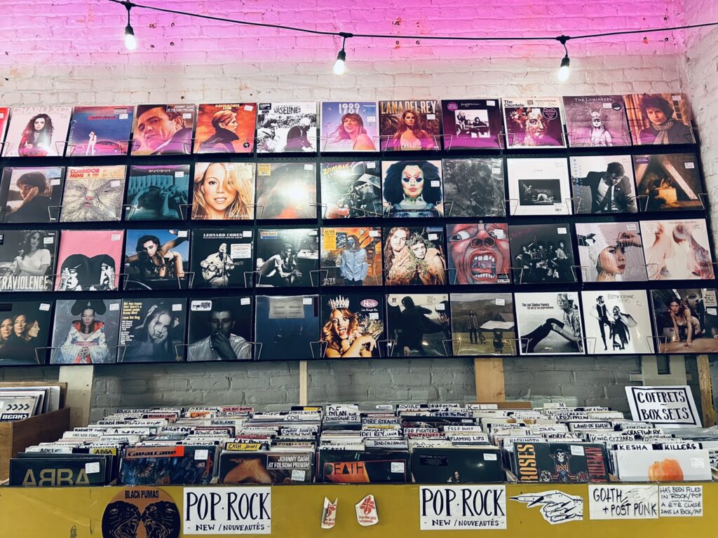 New vinyl wall display and record bins inside Cheap Thrills in Montréal.