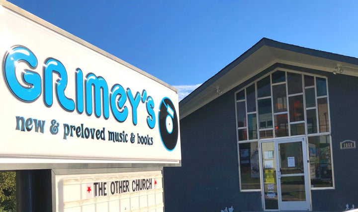 Grimey’s sign and the East Trinity Lane store building in Nashville.
