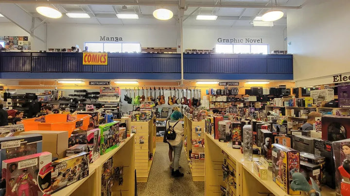 Media shelves, instruments and an upper-level book section inside McKAY’s Nashville.