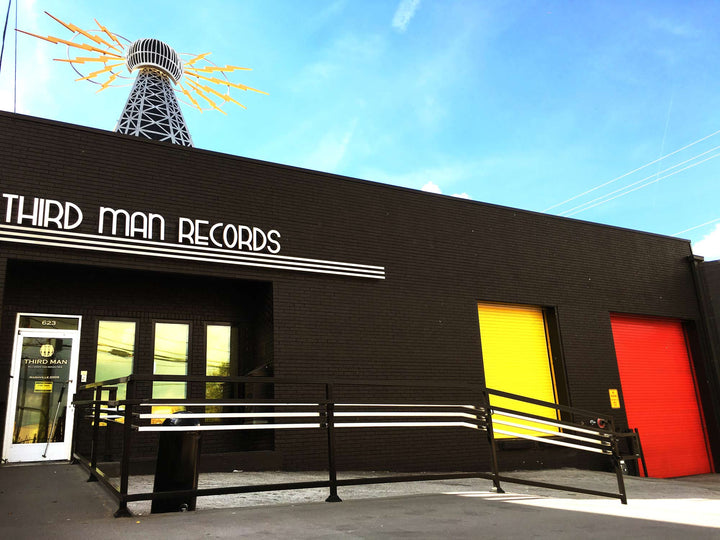 Third Man Records Nashville storefront with yellow and red entrance panels.