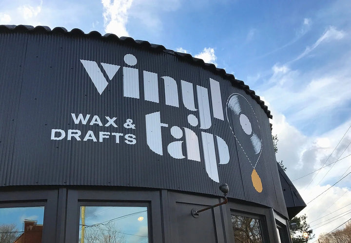 Vinyl Tap’s corner storefront and sign in East Nashville.