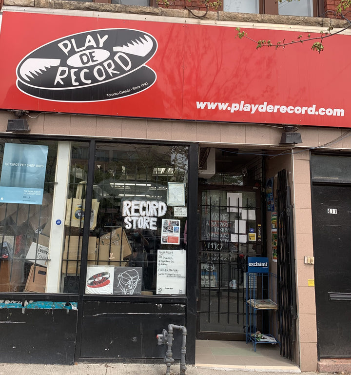 Play De Record storefront at 411 Spadina Avenue in Toronto.